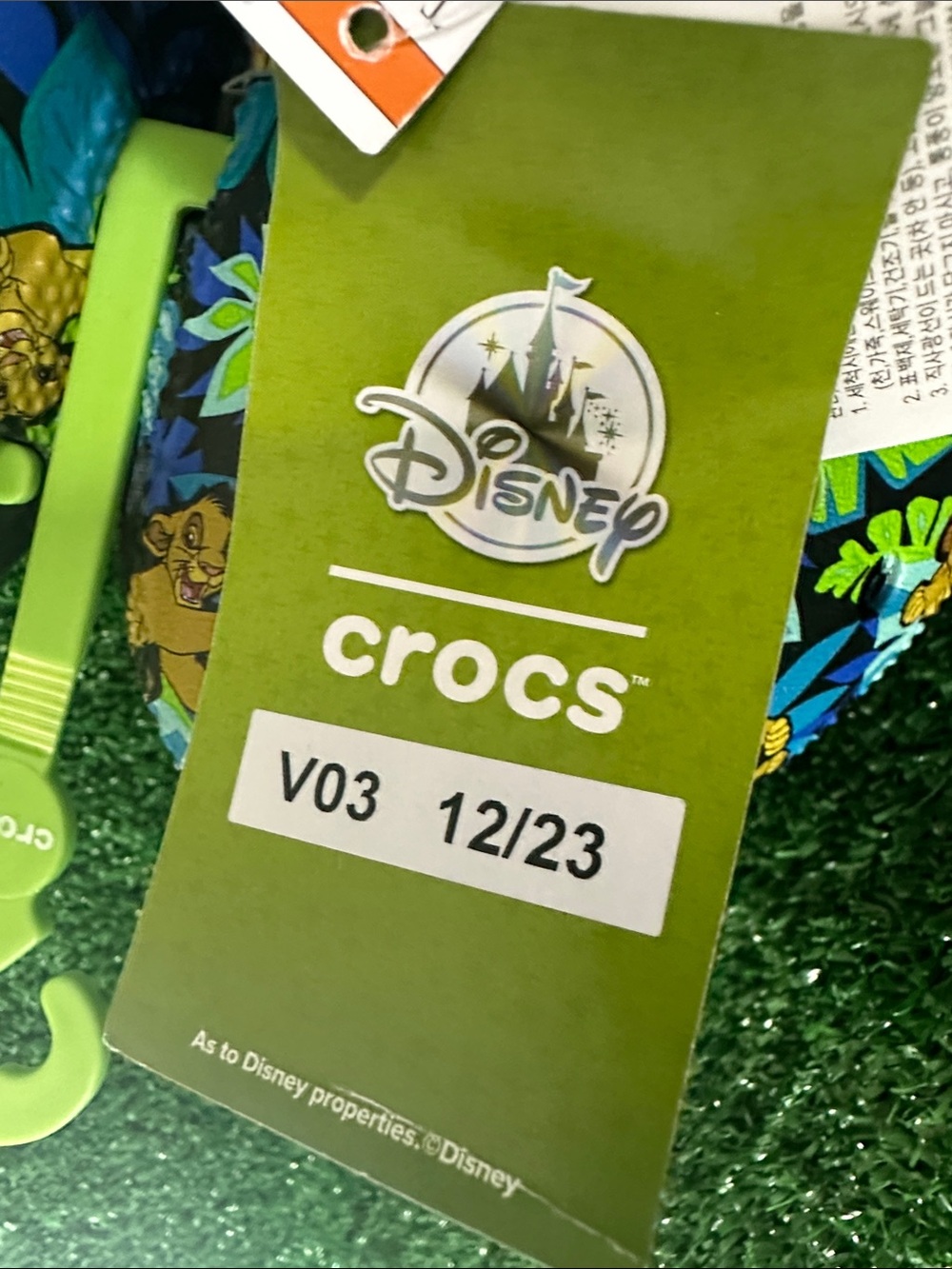 CROCS Kids' Black Tropical Lion King Sandals - Picture 4 of 11